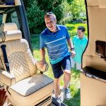 golfer entering the custom mercedes van